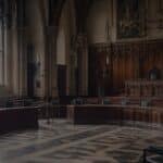 The interior of a British court building, representing the High Court and Upper Tribunal proceedings in which Law Lane Solicitors advises clients on immigration judicial review — challenging unlawful Home Office decisions on grounds of illegality, irrationality, and procedural impropriety.